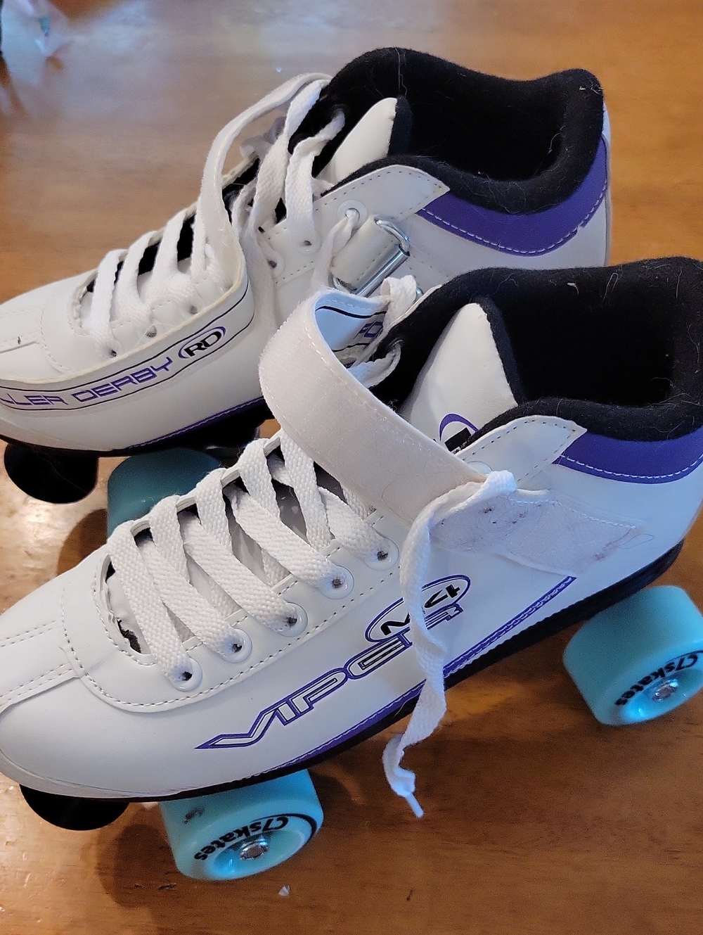 Woman's Size 8 White and Purple Quad Roller Skates